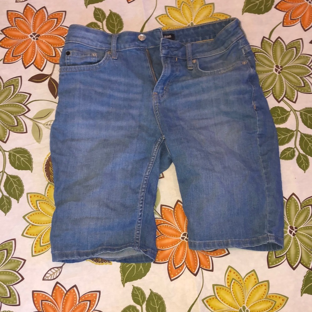 Calvin Klein jean shorts in a blue color.